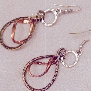 Tear drop shaped earrings with twisted copper and silver